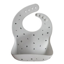 Load image into Gallery viewer, Mushie - Silicone Baby Bib 矽膠圍兜 Letters White
